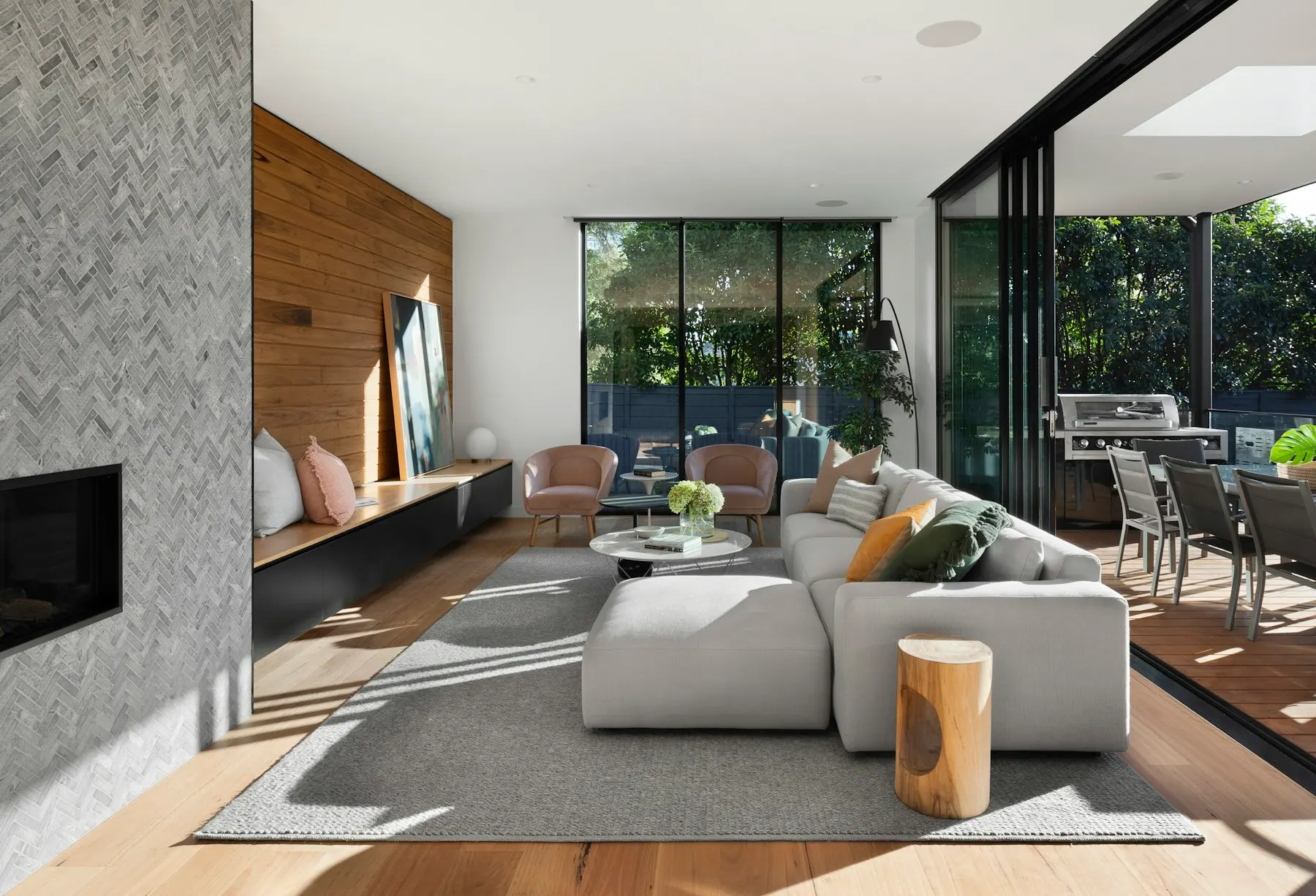Premium open-plan kitchen with wood cabinetry and stone island